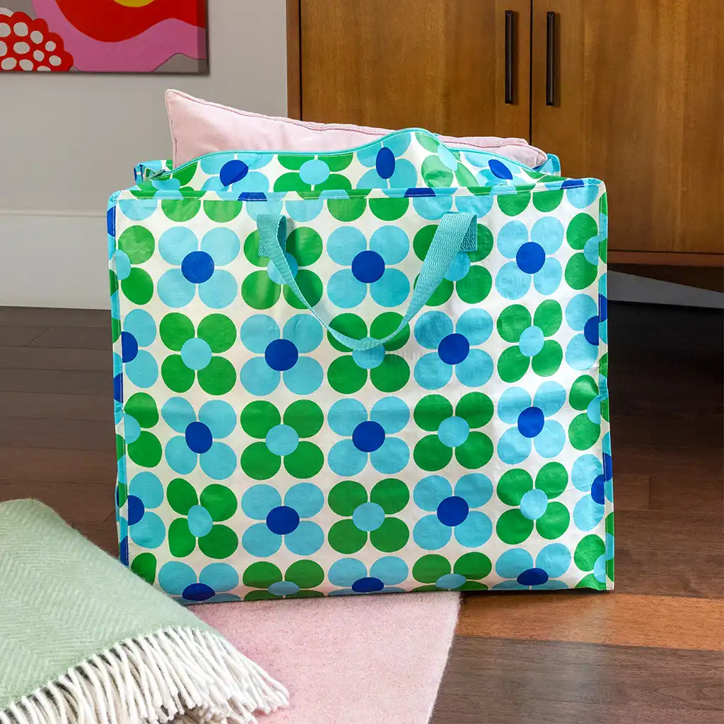 Große Tasche mit Gänseblümchen, grün/blau