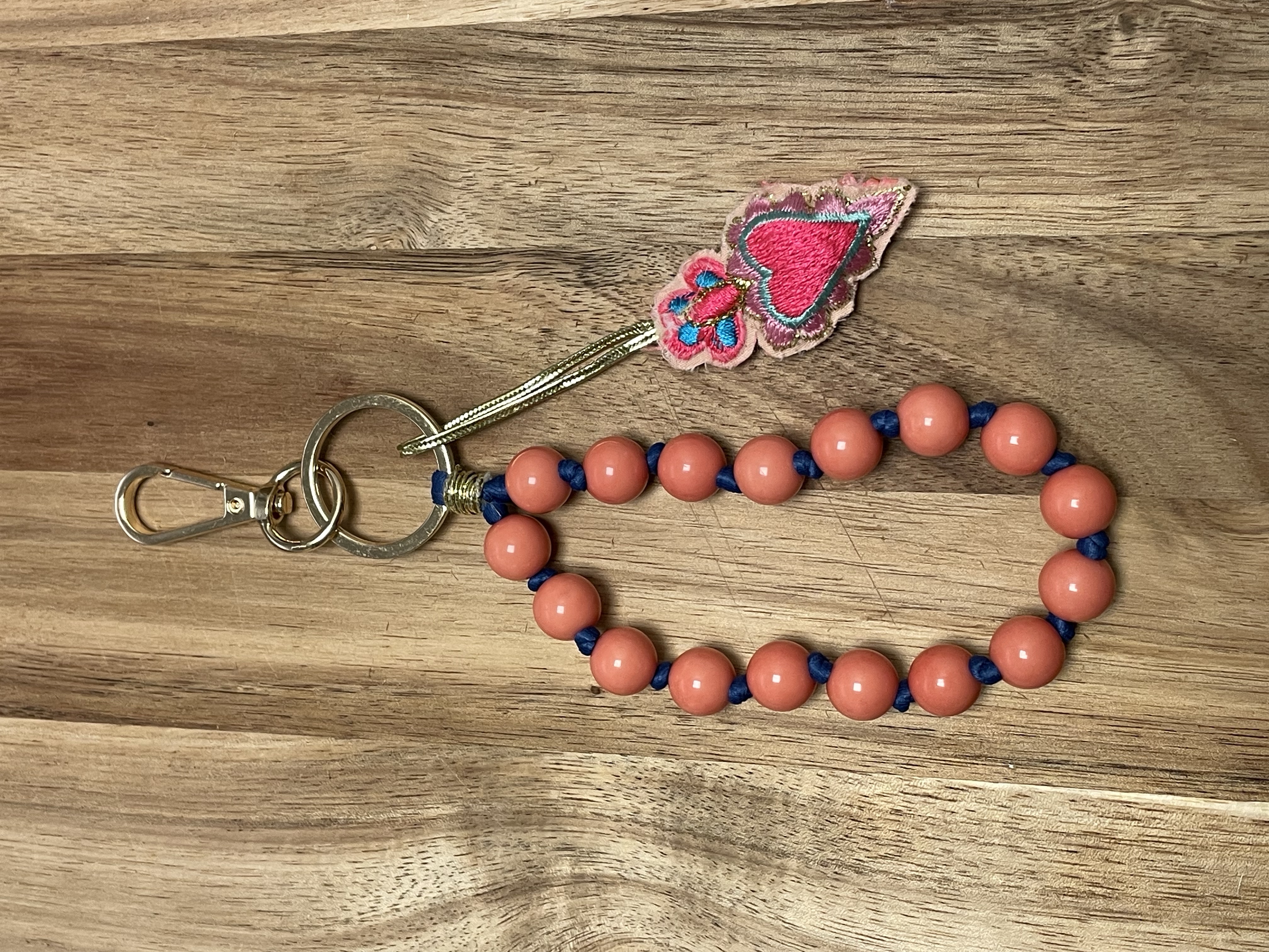 Schlüsselanhänger "bead chain", rosa/apricot