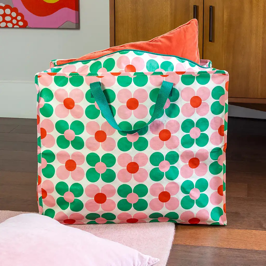 Große Tasche mit Gänseblümchen, grün/rosa